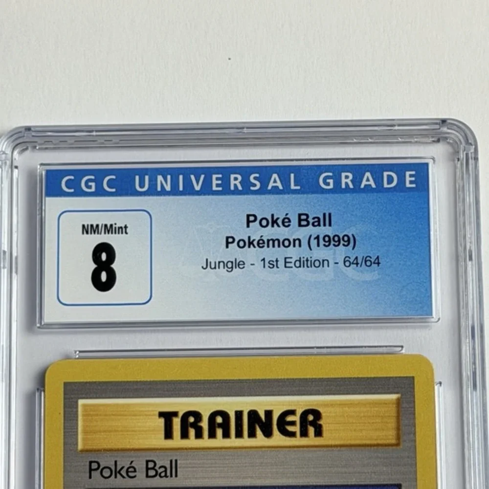 Poke Ball 64/64 Jungle 1st Edition‎ Trainer CGC 8 NM/Mint 1999 TCG Pokemon WotC